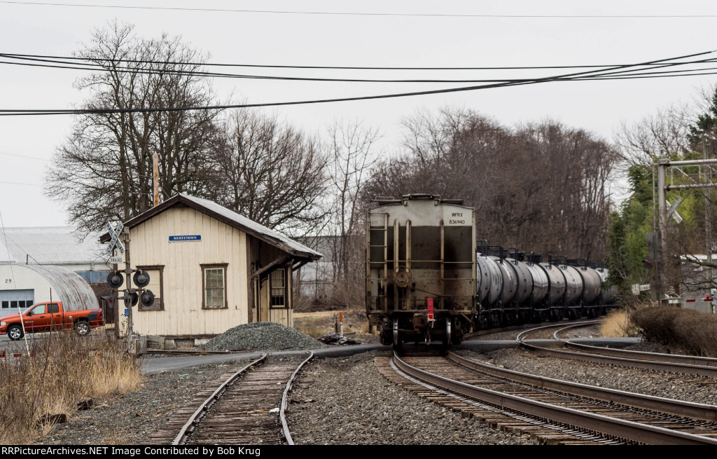 End of the eastbound oil train rolling by the Mertztown depot building